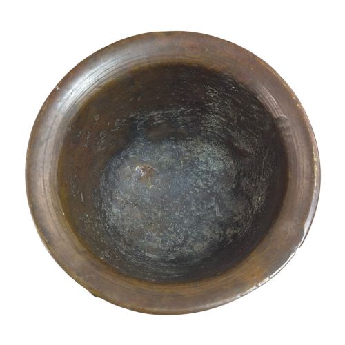 fig 2. A heavy 17th-century cast bronze apothecary mortar featuring raised heraldic coat of arms motifs and side lugs around a flared rim.