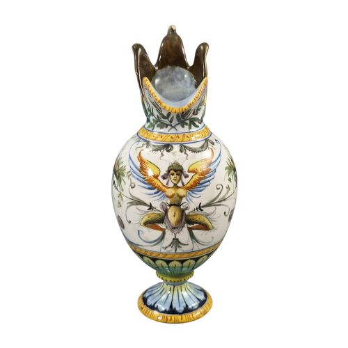 fig 4. A pair of late 19th-century Italian Cantagalli tin-glazed majolica ceramic vessels, comprising a ruffled-rim vase and a sculpted ewer decorated with painted Renaissance grotesque motifs.