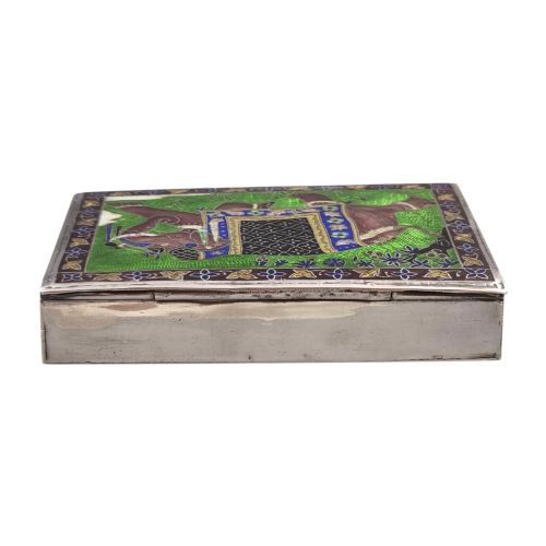 fig 4. A rectangular sterling silver box featuring a colourful enamelled scene of a decorated Indian elephant set against a green background with a patterned border.