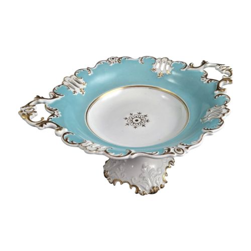 fig 1. A Victorian Coalport bone china tazza featuring a turquoise border, central floral motif, gilded scroll accents, and a footed stem base.