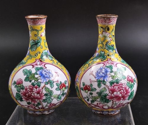 fig 2. A pair of 19th-century Chinese Canton enamel miniature vases featuring hand-painted roosters and foliage framed within circular medallions against a bright yellow ground.