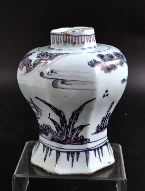 fig 2. An octagonal antique Dutch Delft tin-glazed earthenware baluster vase painted in blue and manganese depicting a Chinese scholar.