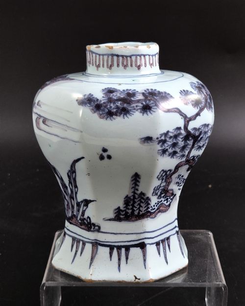 fig 3. An octagonal antique Dutch Delft tin-glazed earthenware baluster vase painted in blue and manganese depicting a Chinese scholar.