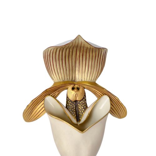 fig 3. A pair of 1886 Royal Worcester ivory porcelain wall pockets shaped like ladys slipper orchids with gold gilded highlights.