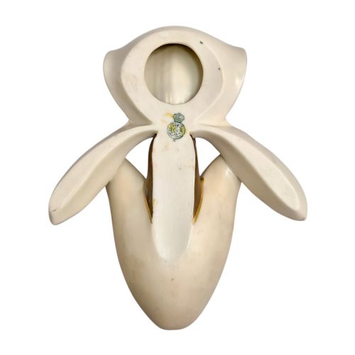 fig 4. A pair of 1886 Royal Worcester ivory porcelain wall pockets shaped like ladys slipper orchids with gold gilded highlights.
