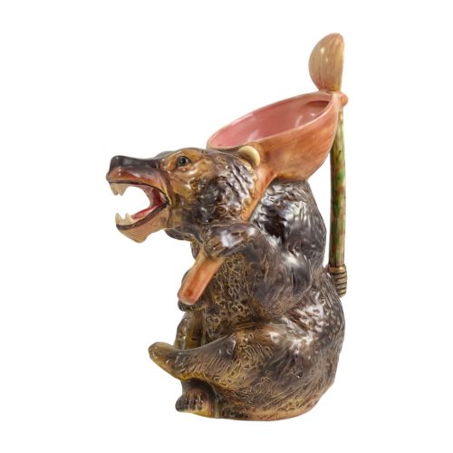 fig 2. A set of three graduating Victorian majolica syrup jugs sculpted in the form of seated bears with pink glazed interiors.