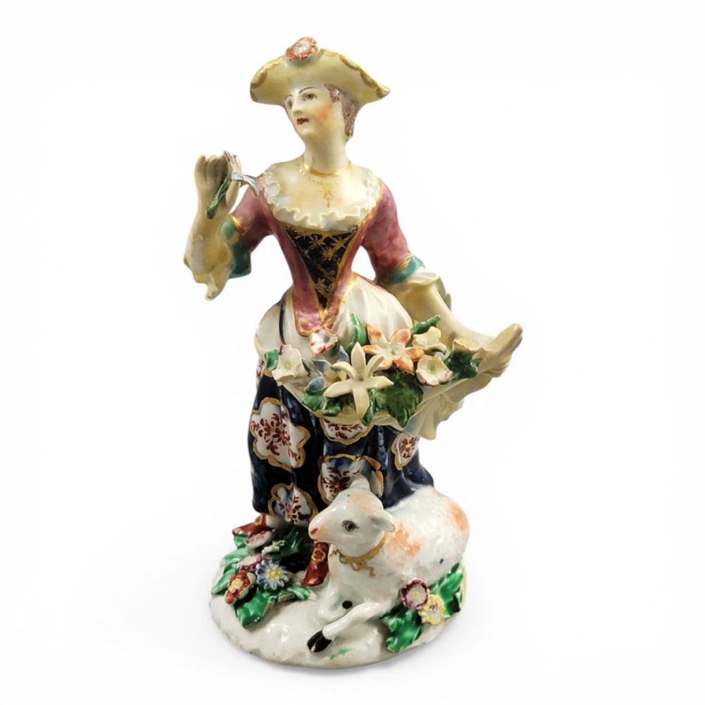 Bow Porcelain Figure of a Lady with Lamb and Flowers, circa 1760