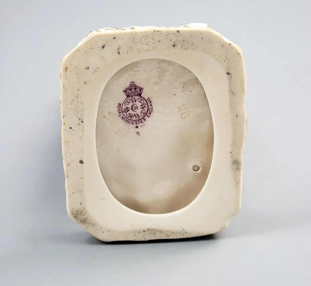 A standing porcelain figurine depicting a lady in a floral dress and bonnet with gilded trim on a textured base. View IV