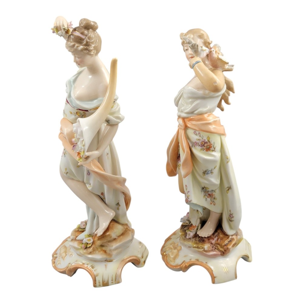 A pair of late 18th-century Volkstedt painted porcelain allegorical figures on ornate gilded scrollwork bases. View III