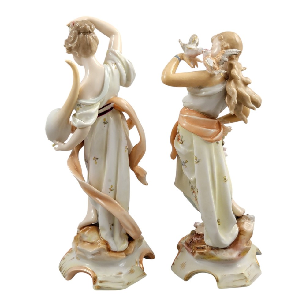 A pair of late 18th-century Volkstedt painted porcelain allegorical figures on ornate gilded scrollwork bases. View IV