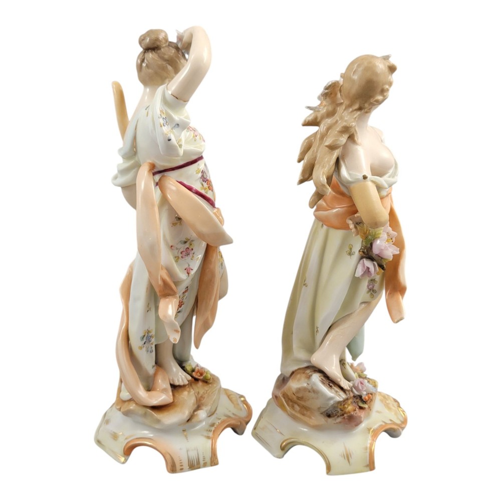 A pair of late 18th-century Volkstedt painted porcelain allegorical figures on ornate gilded scrollwork bases. View VI
