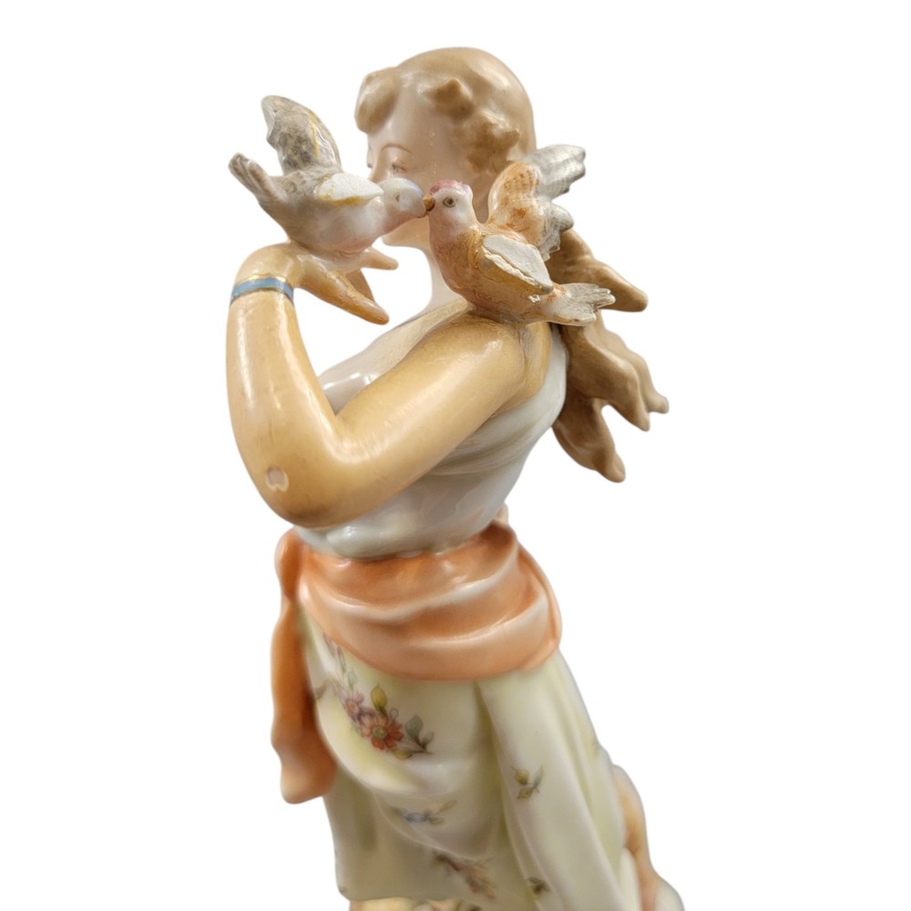 A pair of late 18th-century Volkstedt painted porcelain allegorical figures on ornate gilded scrollwork bases. View XII