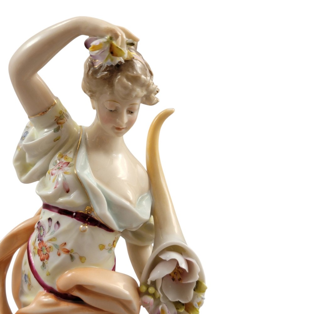 A pair of late 18th-century Volkstedt painted porcelain allegorical figures on ornate gilded scrollwork bases. View XIV
