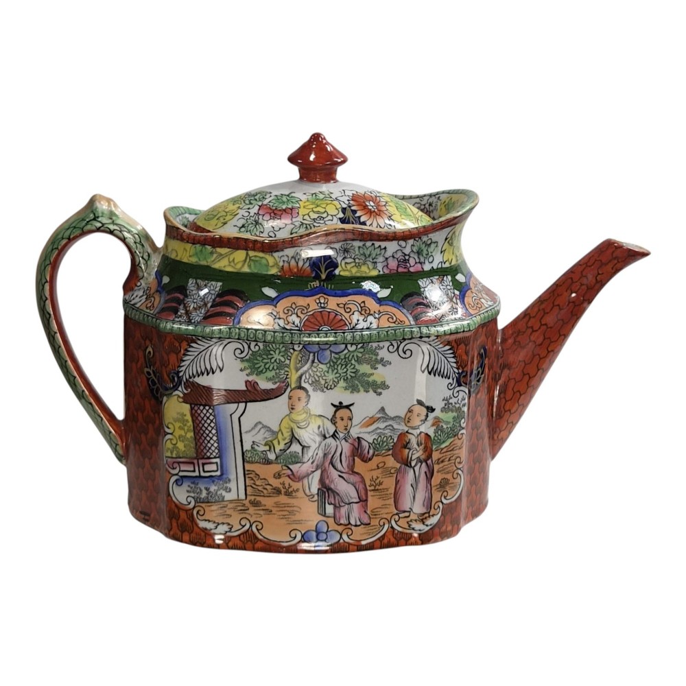 An antique Masons ironstone oval teapot featuring a red scale pattern and a hand-painted Chinoiserie scene with figures. View V
