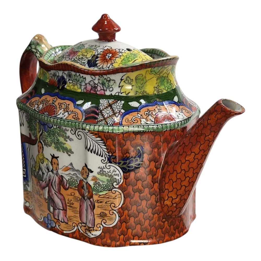 An antique Masons ironstone oval teapot featuring a red scale pattern and a hand-painted Chinoiserie scene with figures. View VI