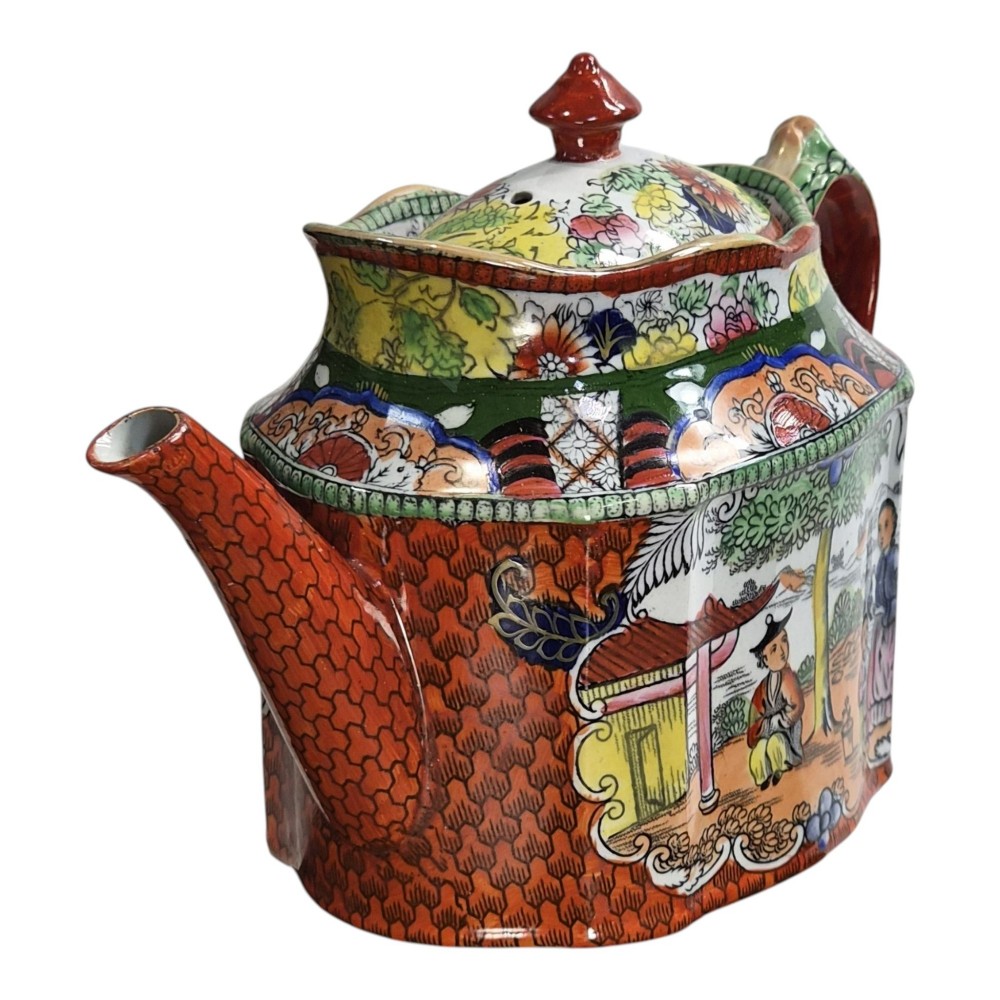 An antique Masons ironstone oval teapot featuring a red scale pattern and a hand-painted Chinoiserie scene with figures. View VII