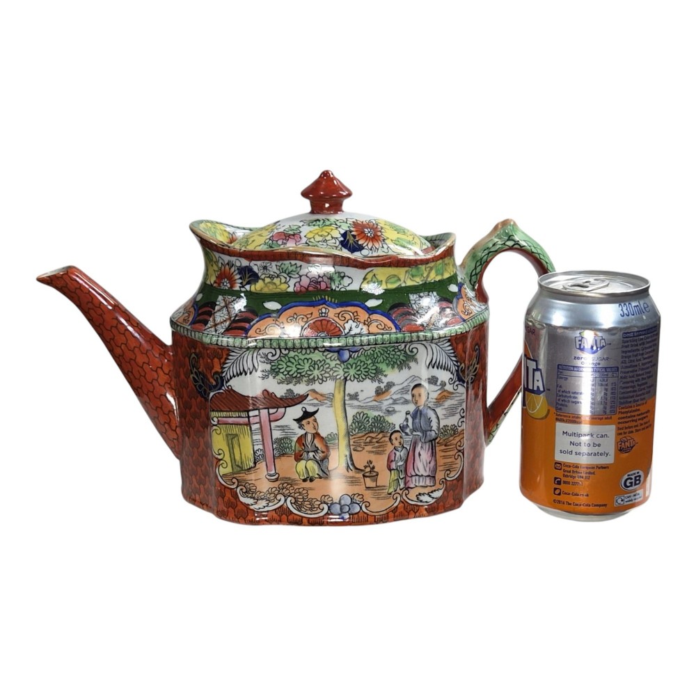 An antique Masons ironstone oval teapot featuring a red scale pattern and a hand-painted Chinoiserie scene with figures. View VIII