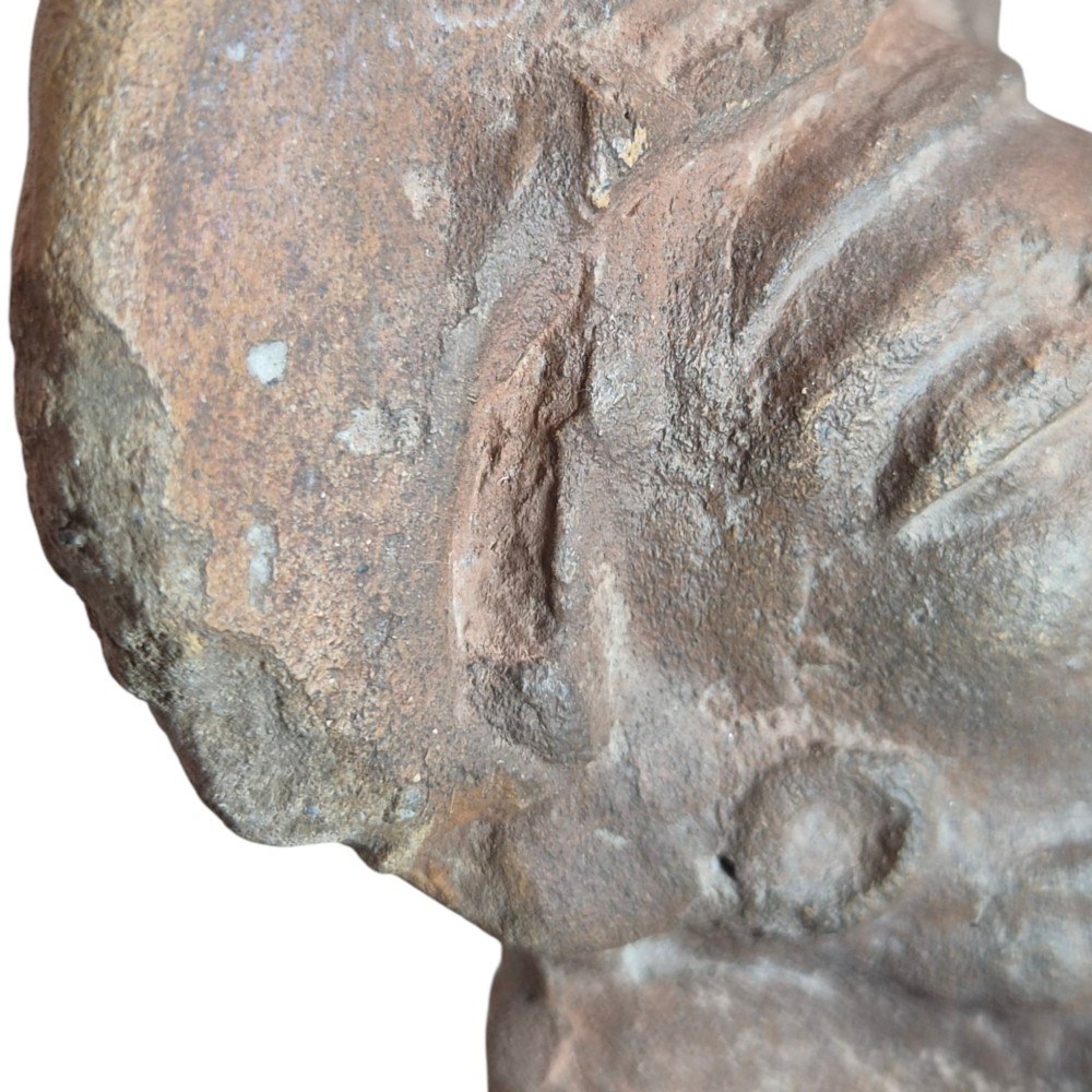 A Pre-Columbian earthenware terracotta sculpture depicting a seated female figure with a flared headdress, mounted on a rectangular dark wooden base. View VII