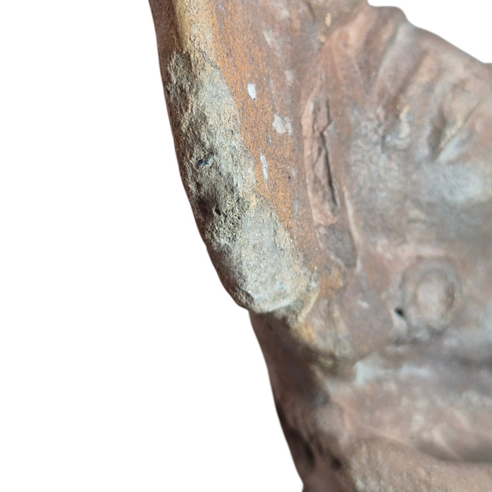 A Pre-Columbian earthenware terracotta sculpture depicting a seated female figure with a flared headdress, mounted on a rectangular dark wooden base. View VIII