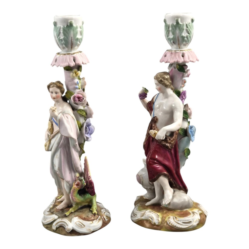 A pair of late nineteenth-century Volkstedt polychrome porcelain allegorical candlesticks depicting classical figures representing Summer and Autumn on rococo scroll bases. View II