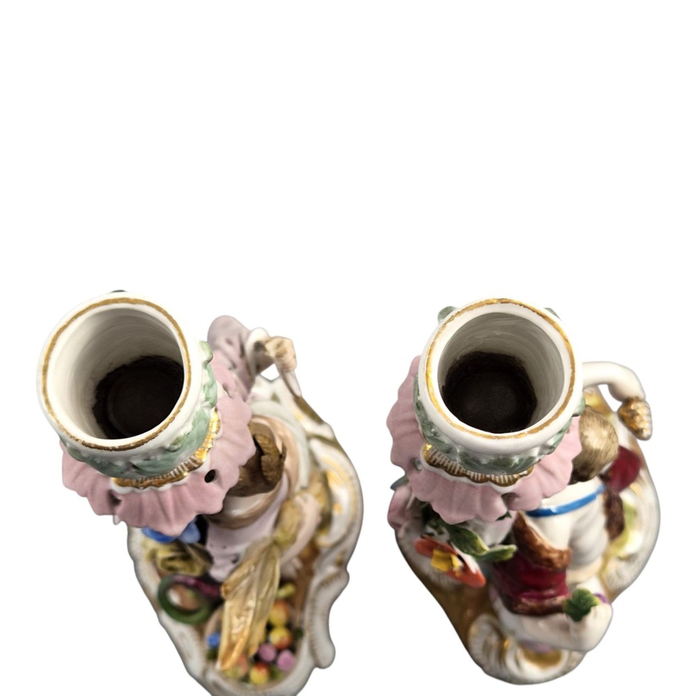 A pair of late nineteenth-century Volkstedt polychrome porcelain allegorical candlesticks depicting classical figures representing Summer and Autumn on rococo scroll bases. View V