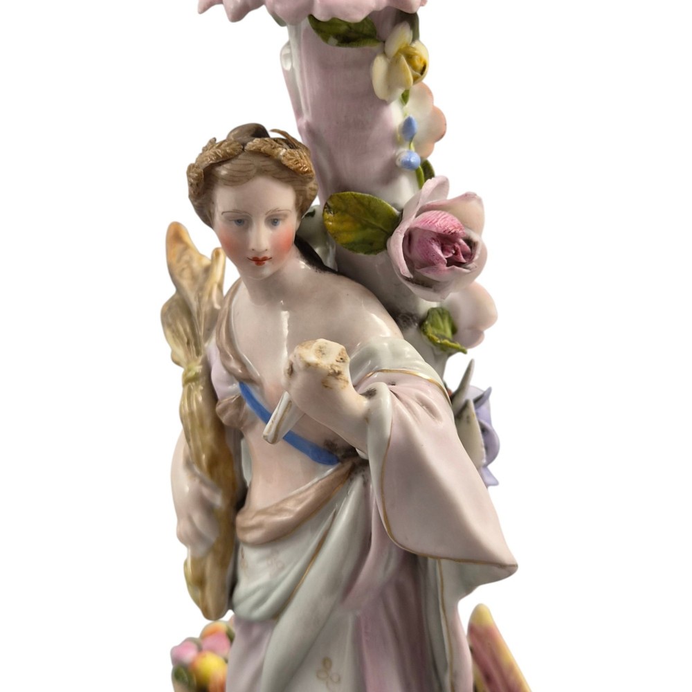 A pair of late nineteenth-century Volkstedt polychrome porcelain allegorical candlesticks depicting classical figures representing Summer and Autumn on rococo scroll bases. View IX