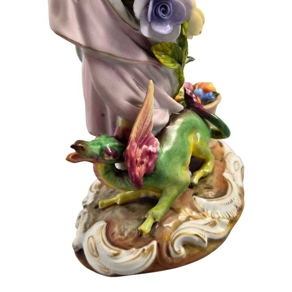 A pair of late nineteenth-century Volkstedt polychrome porcelain allegorical candlesticks depicting classical figures representing Summer and Autumn on rococo scroll bases. View X