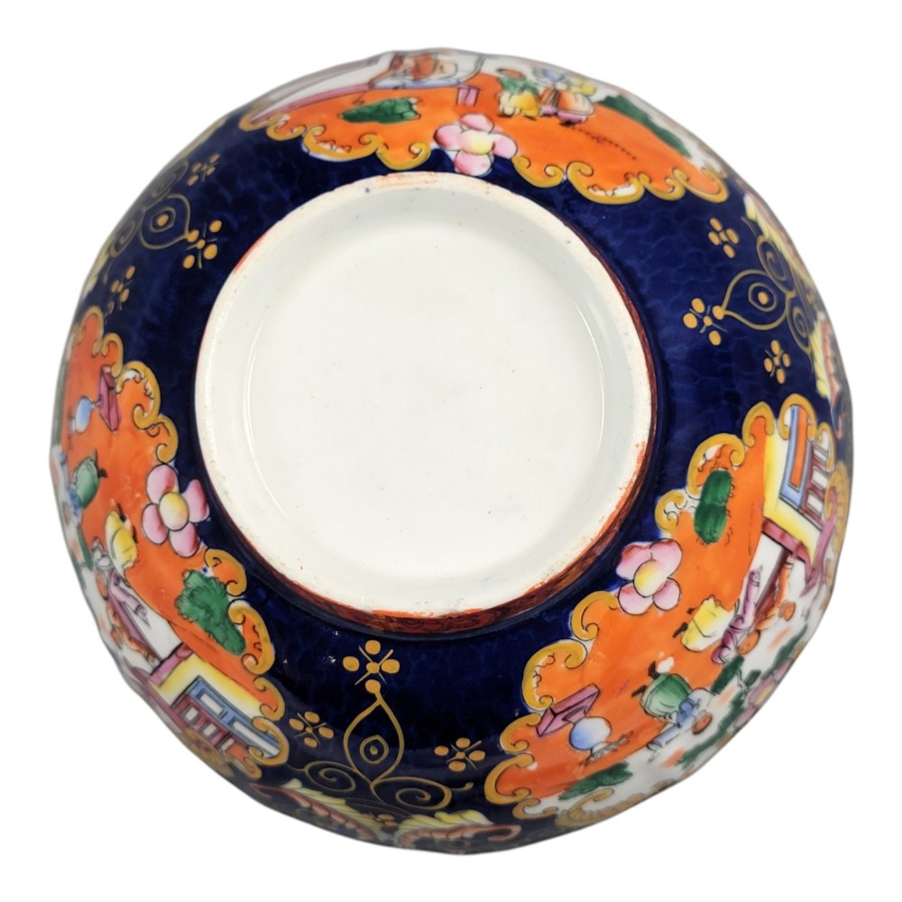 A Regency-era Masons Patent Ironstone lidded bowl decorated with elaborate Chinoiserie motifs in cobalt blue, orange, green, and gilt detailing. View IX