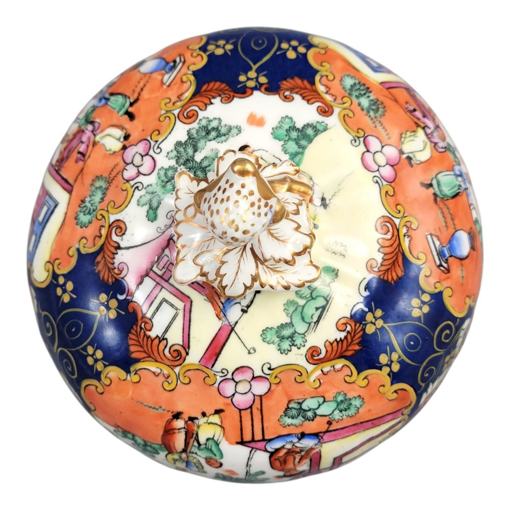 A Regency-era Masons Patent Ironstone lidded bowl decorated with elaborate Chinoiserie motifs in cobalt blue, orange, green, and gilt detailing. View X
