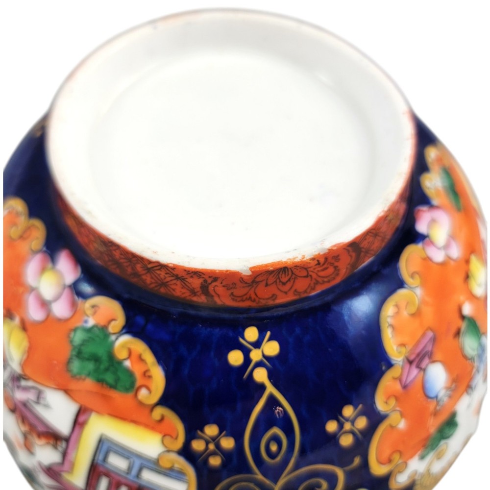 A Regency-era Masons Patent Ironstone lidded bowl decorated with elaborate Chinoiserie motifs in cobalt blue, orange, green, and gilt detailing. View XII