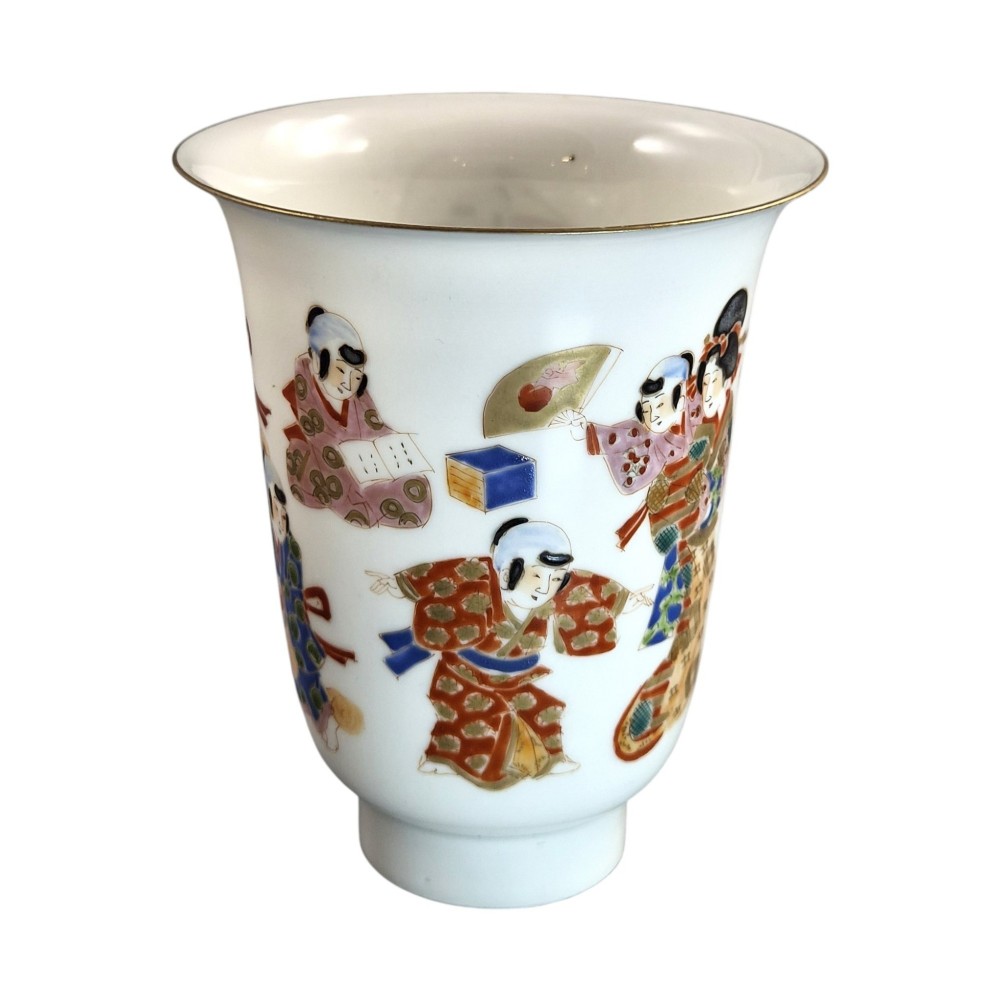 A white translucent eggshell porcelain vase with a flared rim, featuring hand-painted Japanese figures in colourful kimonos and a thin gilded edge. View V
