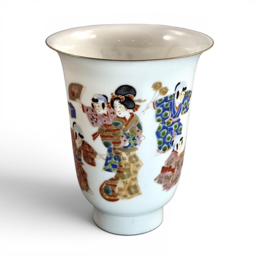 A white translucent eggshell porcelain vase with a flared rim, featuring hand-painted Japanese figures in colourful kimonos and a thin gilded edge.