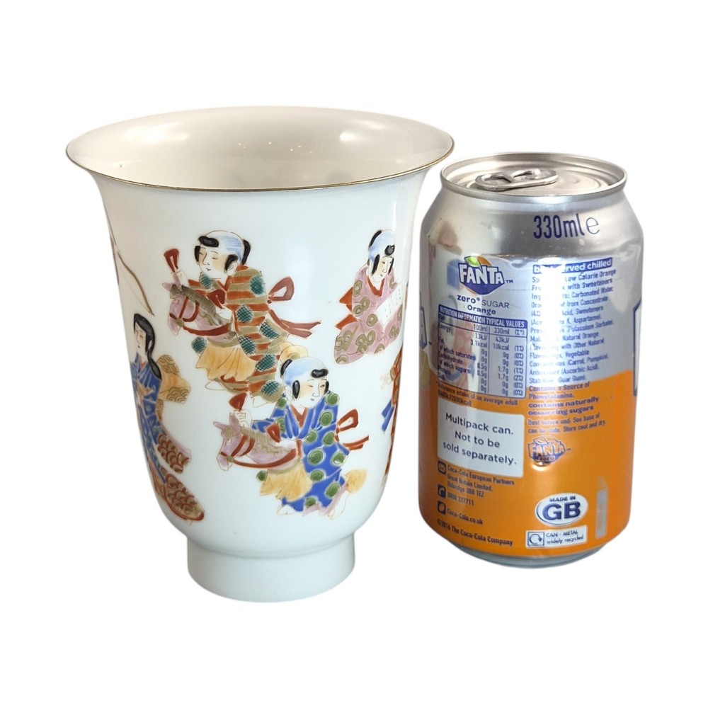 A white translucent eggshell porcelain vase with a flared rim, featuring hand-painted Japanese figures in colourful kimonos and a thin gilded edge. View X