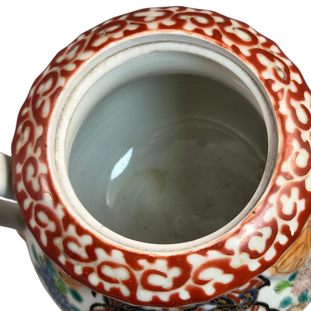A covered Japanese Imari porcelain sugar bowl featuring double side handles, a pointed gilded finial, and hand-painted samurai and floral motifs in red, blue, green, and gold enamels. View VIII