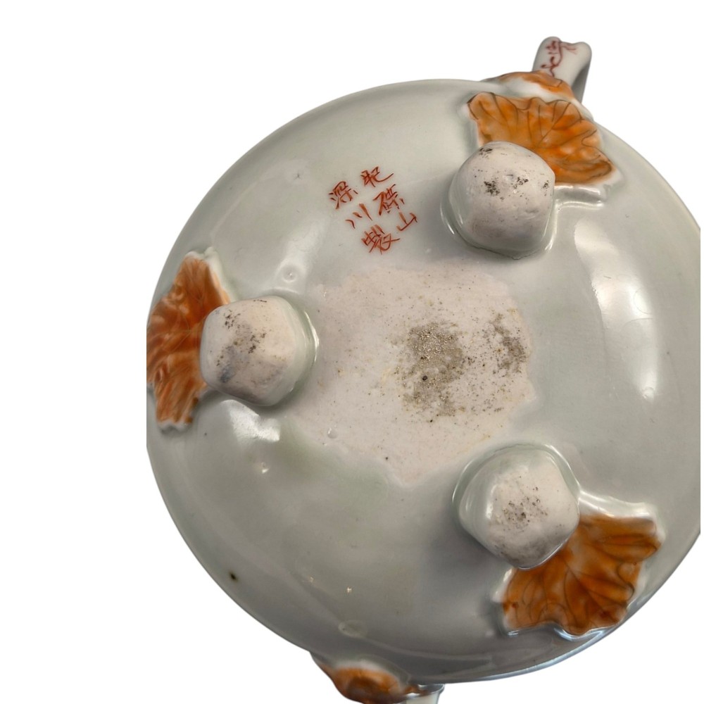 A covered Japanese Imari porcelain sugar bowl featuring double side handles, a pointed gilded finial, and hand-painted samurai and floral motifs in red, blue, green, and gold enamels. View XI