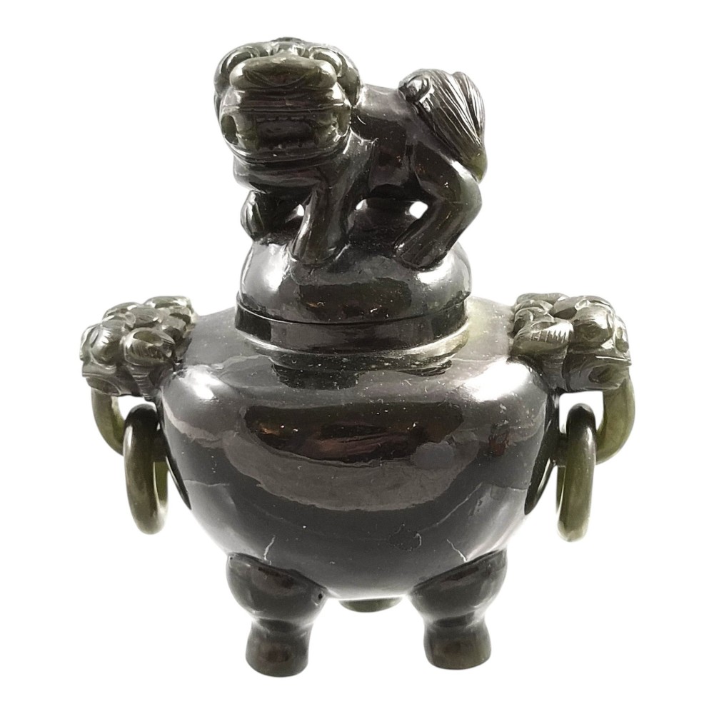 A hand-carved dark green jade tripod censer featuring a foo dog lid finial and lion mask handles with carved loose rings. View II