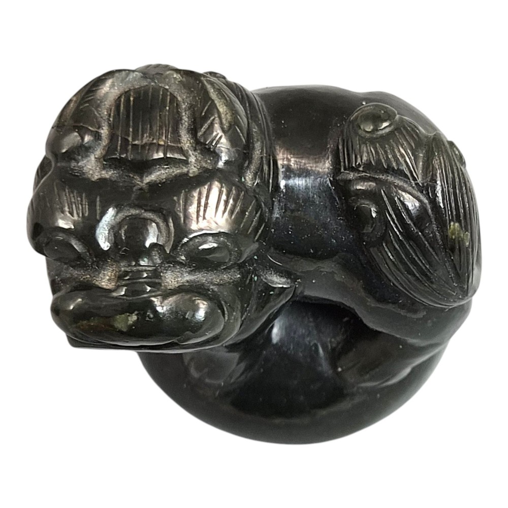 A hand-carved dark green jade tripod censer featuring a foo dog lid finial and lion mask handles with carved loose rings. View XI