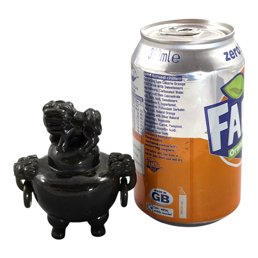 A hand-carved dark green jade tripod censer featuring a foo dog lid finial and lion mask handles with carved loose rings. View XIII