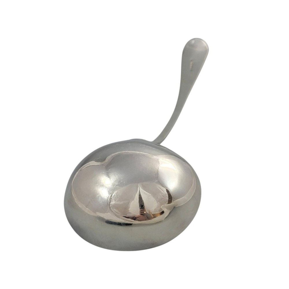 A Georgian sterling silver soup ladle featuring a deep circular bowl, a long curved stem in the Old English pattern, and an engraved crest near the handle tip. View II