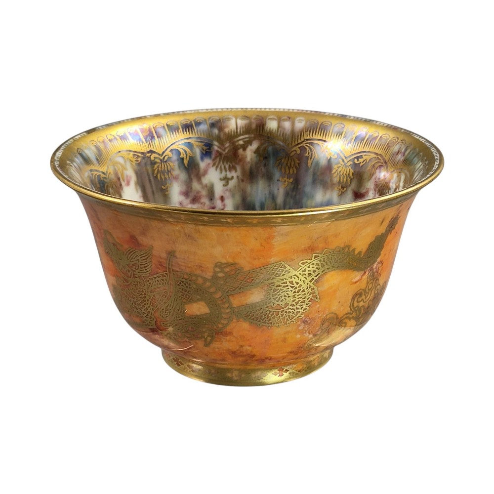 An antique ceramic bowl with a mottled orange lustre glaze on the exterior, decorated with a gold gilded dragon, and a pearlescent interior with a gilded scalloped border. View VIII