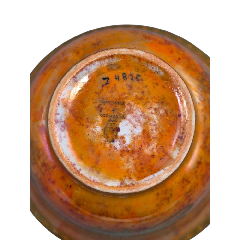 An antique ceramic bowl with a mottled orange lustre glaze on the exterior, decorated with a gold gilded dragon, and a pearlescent interior with a gilded scalloped border. View XII