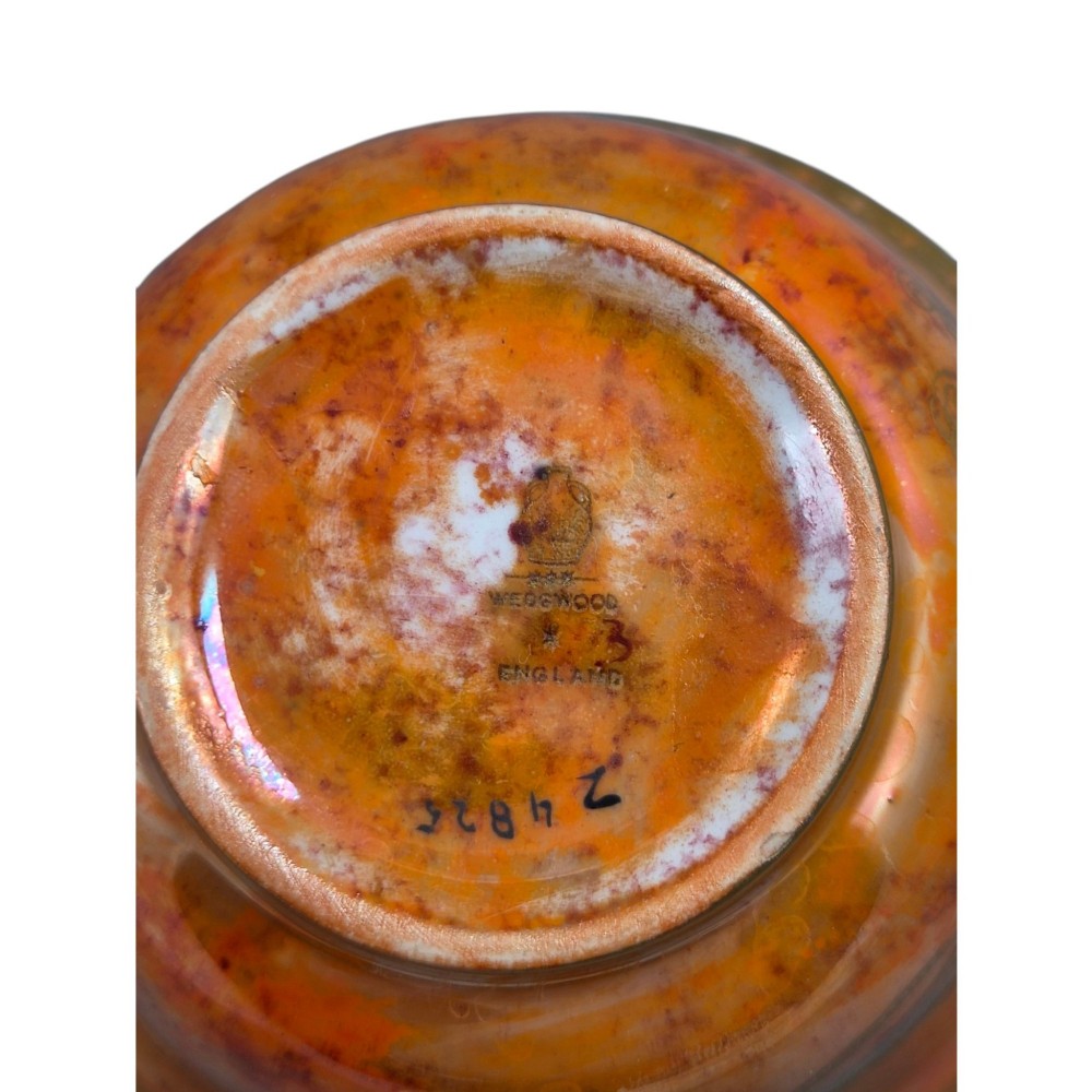 An antique ceramic bowl with a mottled orange lustre glaze on the exterior, decorated with a gold gilded dragon, and a pearlescent interior with a gilded scalloped border. View XIII