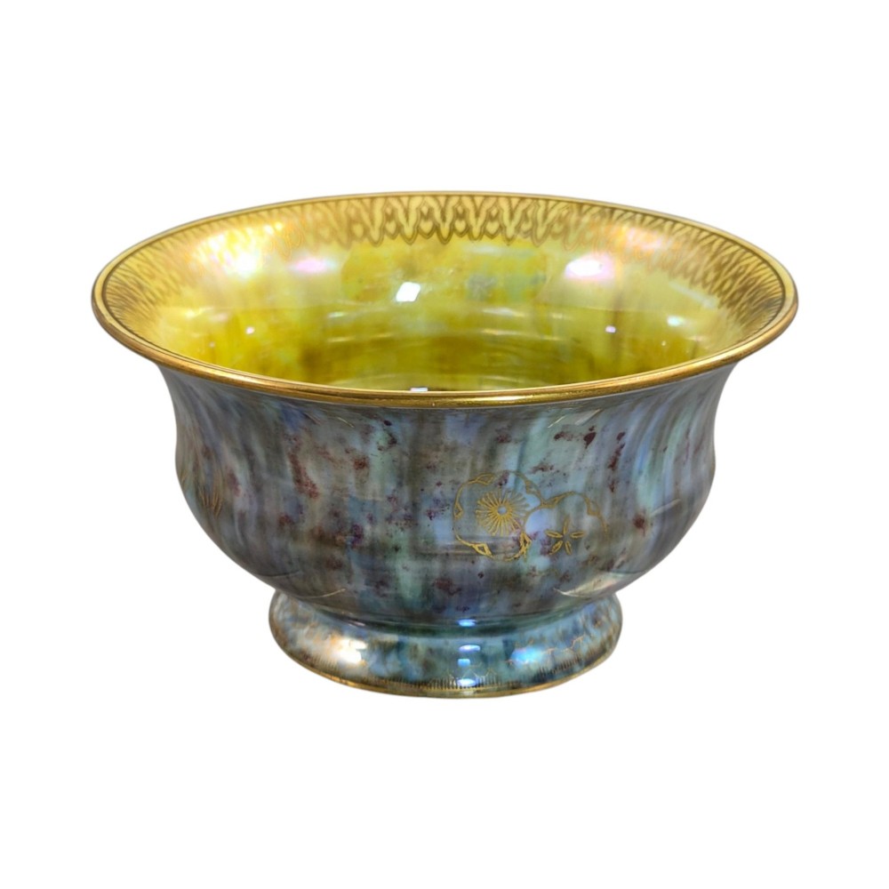 An iridescent blue footed porcelain bowl with gilded dragon motifs and a patterned gold interior rim. View III