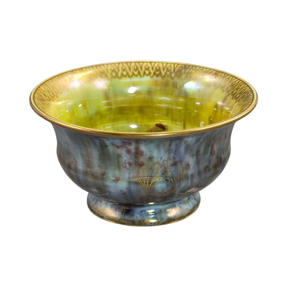 An iridescent blue footed porcelain bowl with gilded dragon motifs and a patterned gold interior rim. View VII