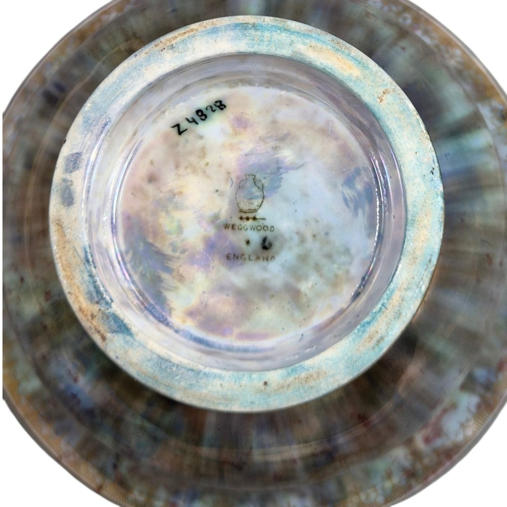 An iridescent blue footed porcelain bowl with gilded dragon motifs and a patterned gold interior rim. View X