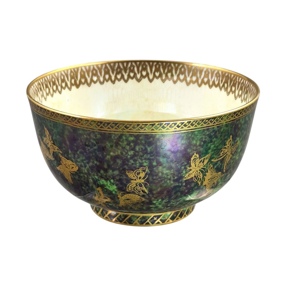 A deep porcelain bowl featuring a mottled green iridescent exterior decorated with gilded butterflies and geometric gold borders around the rim and base. View II