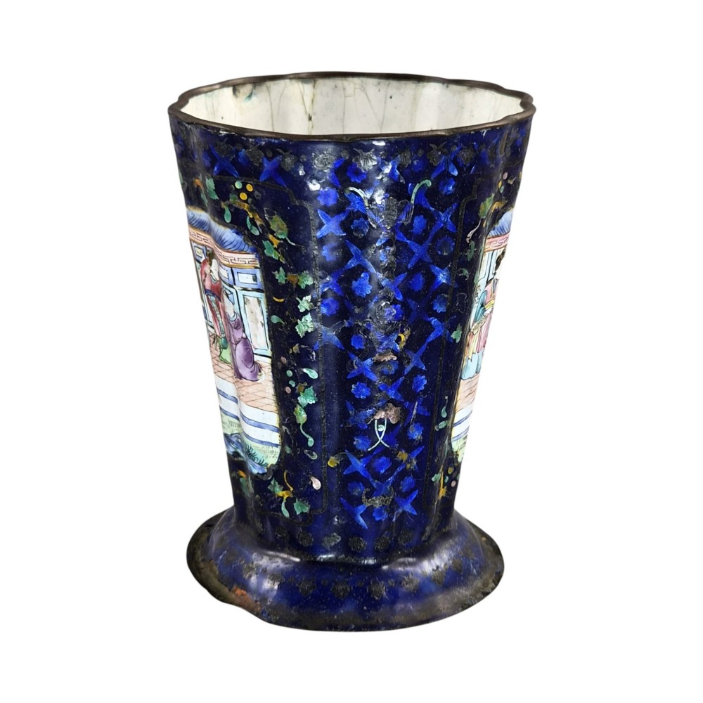 A flared cobalt blue Canton enamel copper vessel painted with a central panel depicting Chinese figures in a courtyard setting. View IV