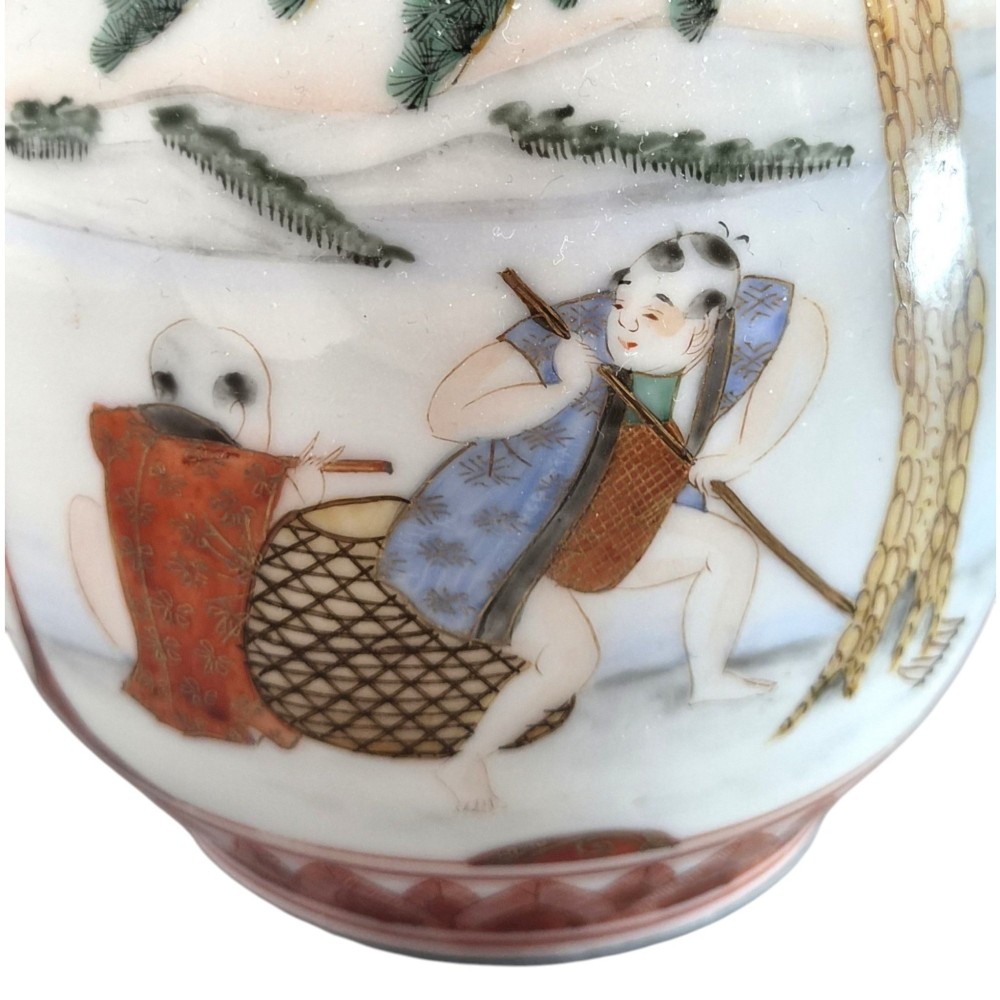 A Japanese Kutani porcelain teapot decorated with iron-red enamel, gilded accents, and hand-painted figurative scenes, seated on a matching pedestal stand. View XI