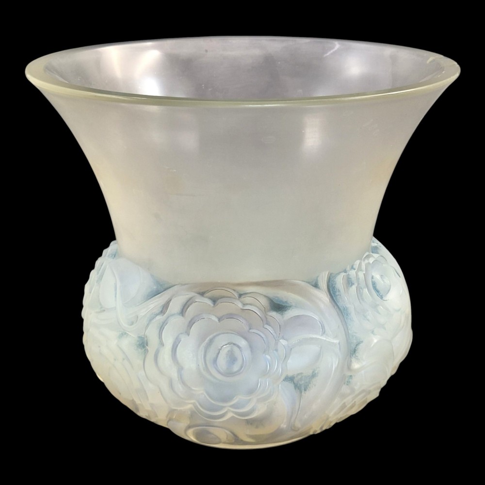 A French opalescent glass vase featuring a flared frosted neck and a rounded base carved with raised ranunculus floral motifs.
