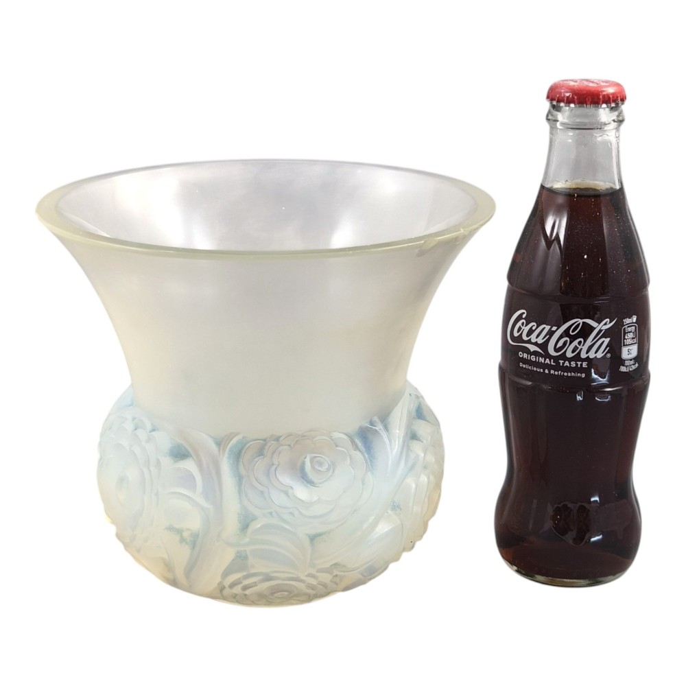 A French opalescent glass vase featuring a flared frosted neck and a rounded base carved with raised ranunculus floral motifs. View X